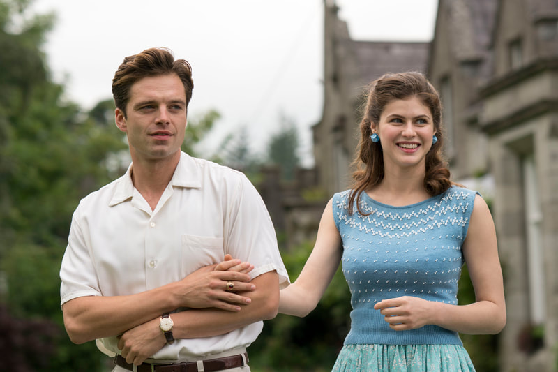 We Have Always Lived In The Castle Still - Constance (Alexandra Daddario) and Charles (Sebastian Stan)  Holding Hands In The Garden