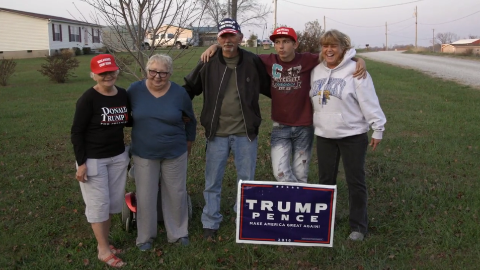 Hillbilly Documentary Still - Family On Front Lawn With Trump & Pence Sign